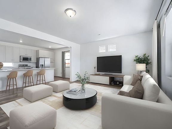 View of spacious living room and kitchen