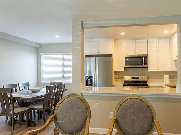 Have a space large enough to comfortably entertain guests! There is very generous counter space with an open concept feel.