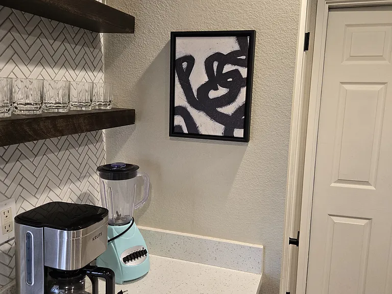 New Art, New Backsplash. Quarts counters.