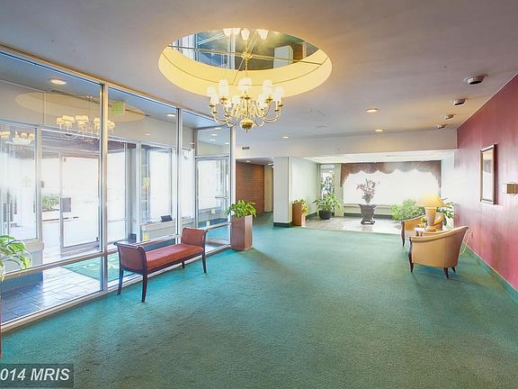 Lobby with receptionist and doorman.