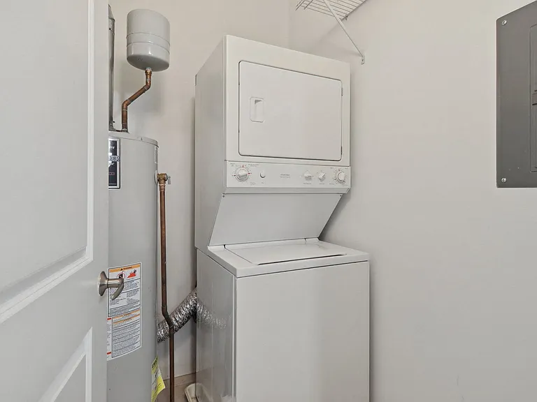 Stacked washer and dryer for in-home laundry