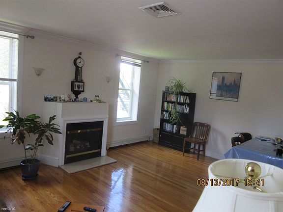 Living Room w/ Fireplace Hardwood floors