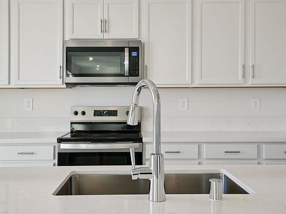 A modeled 4021 plan at a nearby Meritage Homes community
