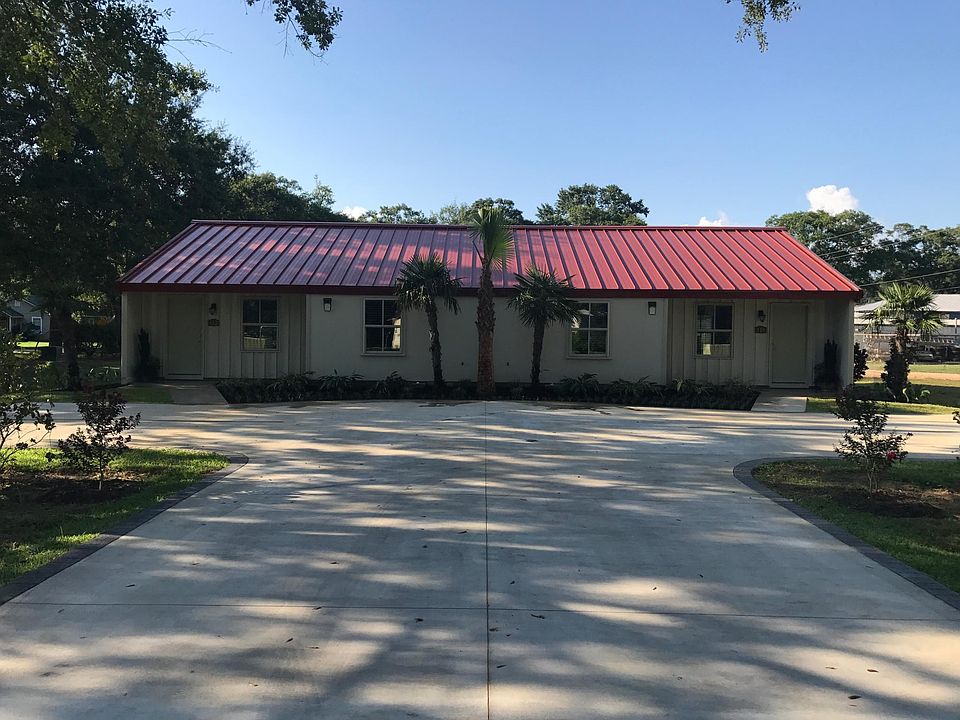 Front entrance; 112 is apartment on left side