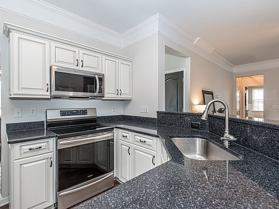 Kitchen with New Appliances and Granite Countertops