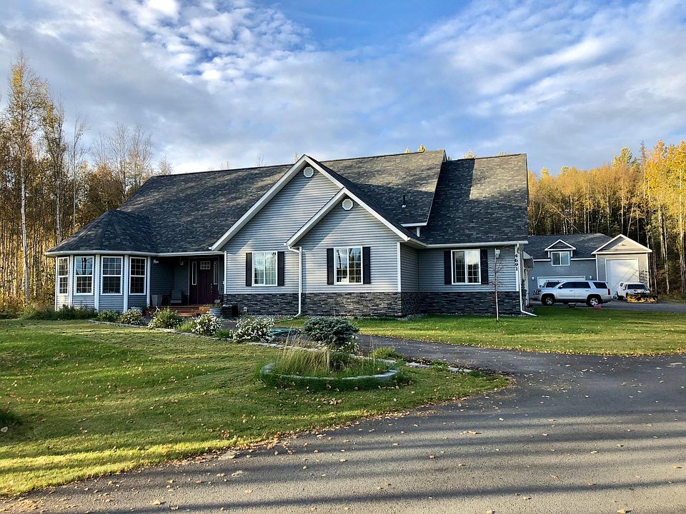 Main house with rental house in background