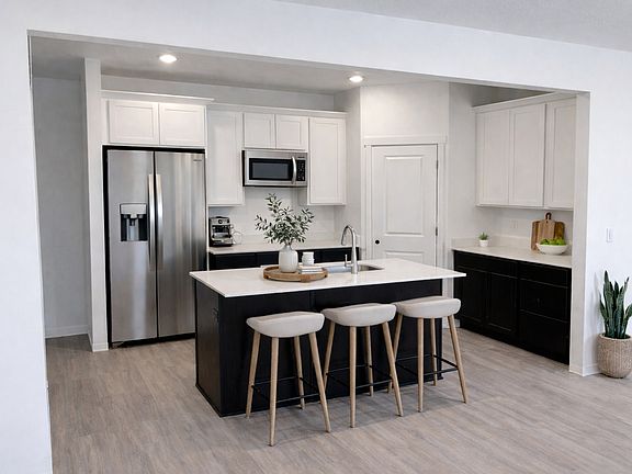 Oxley Floor Plan Kitchen with Large Island - Beacon Pointe Townhomes Saratoga Springs Utah