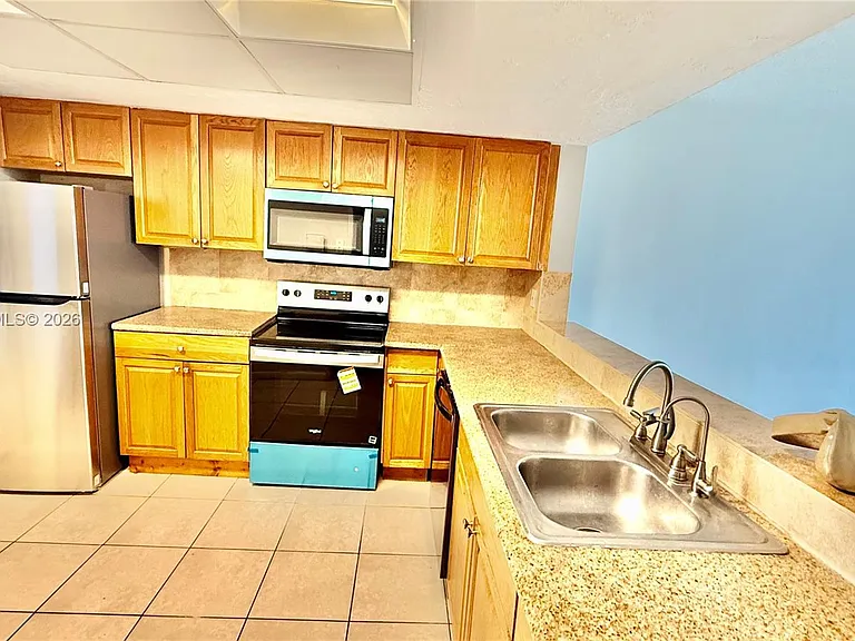 1591 NE Miami Gardens Dr #205 — Photo 15