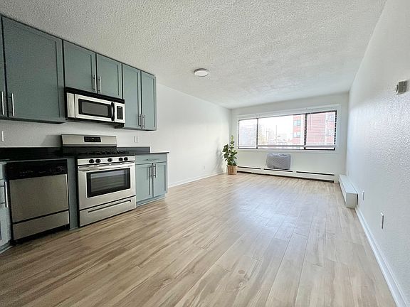 View as from entryway. Kitchen/Living Room.