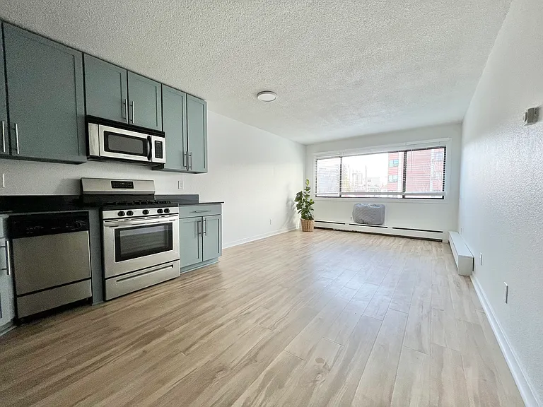 View as from entryway. Kitchen/Living Room.