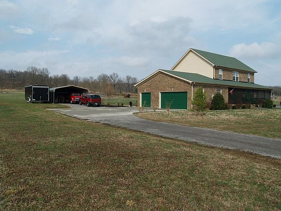 3 Carages + Double Carport