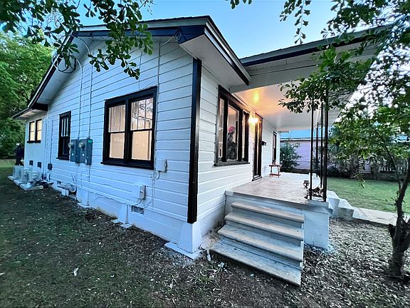 Front left side of home displaying two double windows giving you lots of natural light to the front living room.