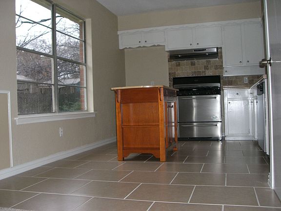 View of new flooring in kitchen both baths & hall