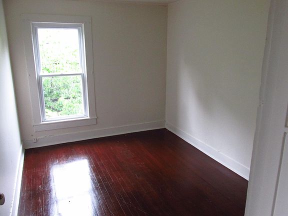 Bedroom 2 2nd floor view of the private yard-fresh paint and