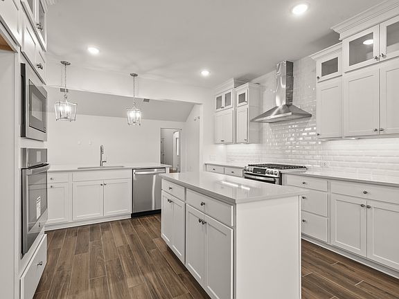Kitchen with upper glass cabinets