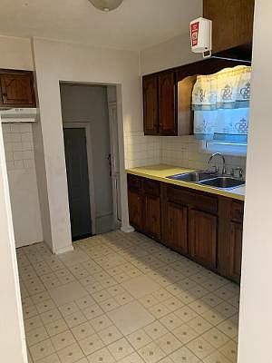 Kitchen without Stove and Refrigerator