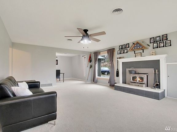 ~Family Room with Cozy Wood Burning Fireplace~ 