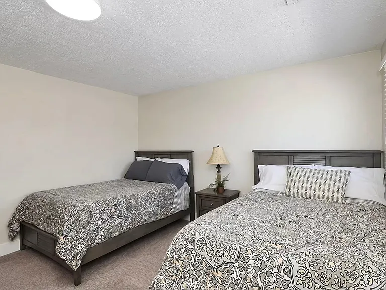 Two full size beds in upstairs bedroom