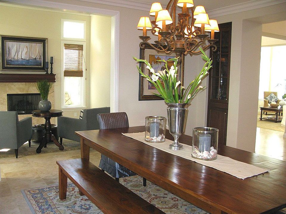 The large dining room is near the study with fireplace.