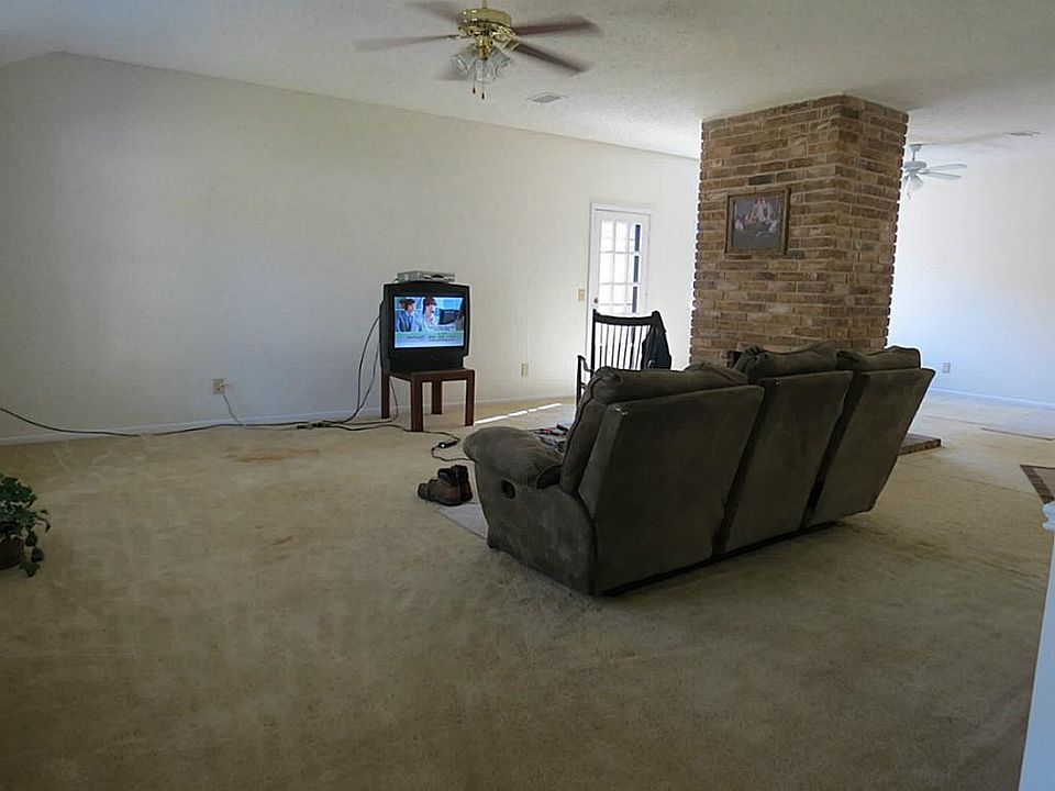Large living area, interior of home has been freshly painted.