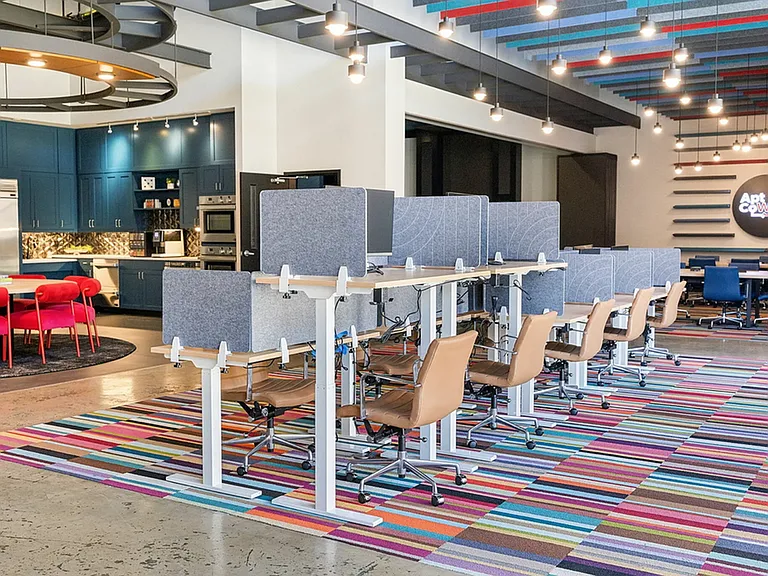 Find the perfect blend of work and collaboration in this vibrant community workspace.