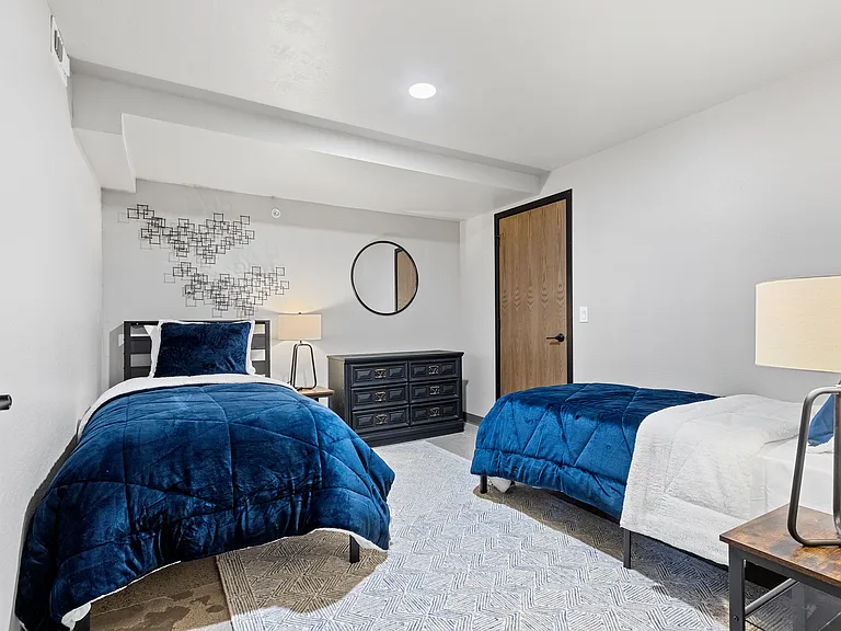 Styled to spark your imagination- two twin beds here show just one way to use this flexible room. The space is yours to make whatever you want!