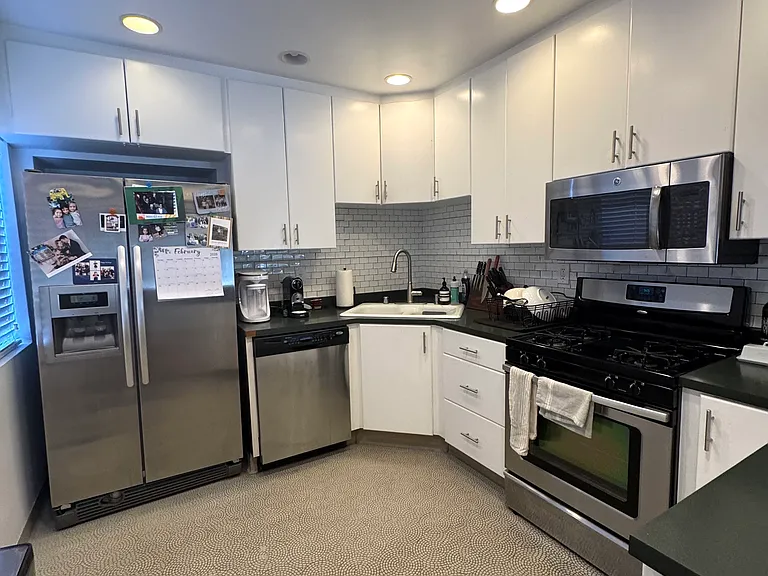 Kitchen: dishwasher, oven, stove top, microwave, refridgerator, stainless steel