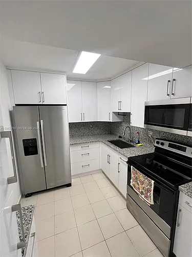 4717 NW 7th St #601-10 Photo 1