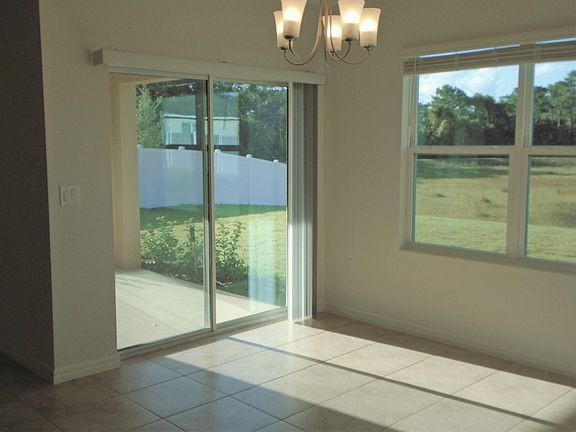 Dining space looking out to porch and rear yard