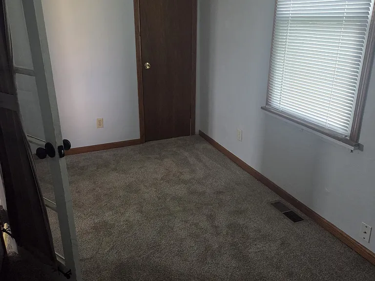 Main Floor Bedroom #1 with Closet Storage