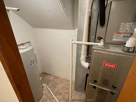 Utility closet off bathroom