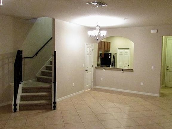 Beautiful living/dining room with a view of the kitchen.