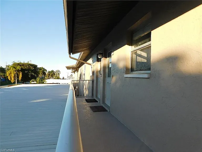Stairs are shared only with next door neighbor. Very nice entrance to condo. Parking under cover just below with your own storage space as well.