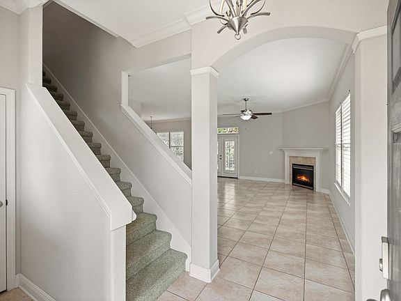 Inside entry with coat closet - leading into living area
