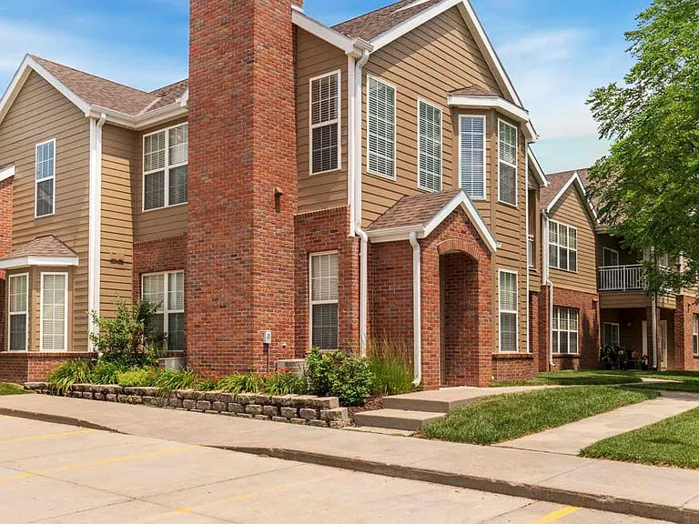 Come home to classic charm with brick-accented exteriors, private entrances, and beautifully landscaped surroundings.