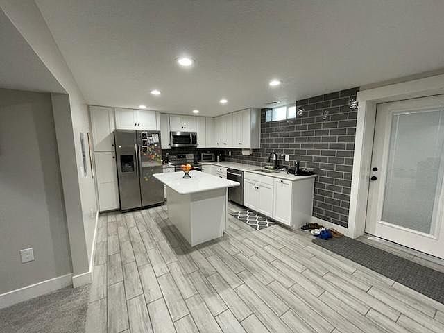 Entry and kitchen. Very good lighting brightens things up. Dimmable switches.