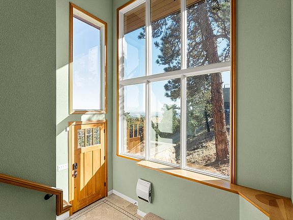 Dramatic two-story entrance--views to right and above.