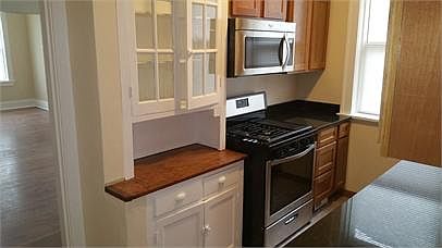Beautifully Restored Built-In Cabinet, Brand New High end Stainless Steel Gas Stove & Microwave