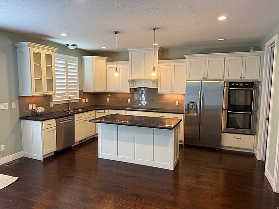 2nd image of 12037 N Grenoble Way W
