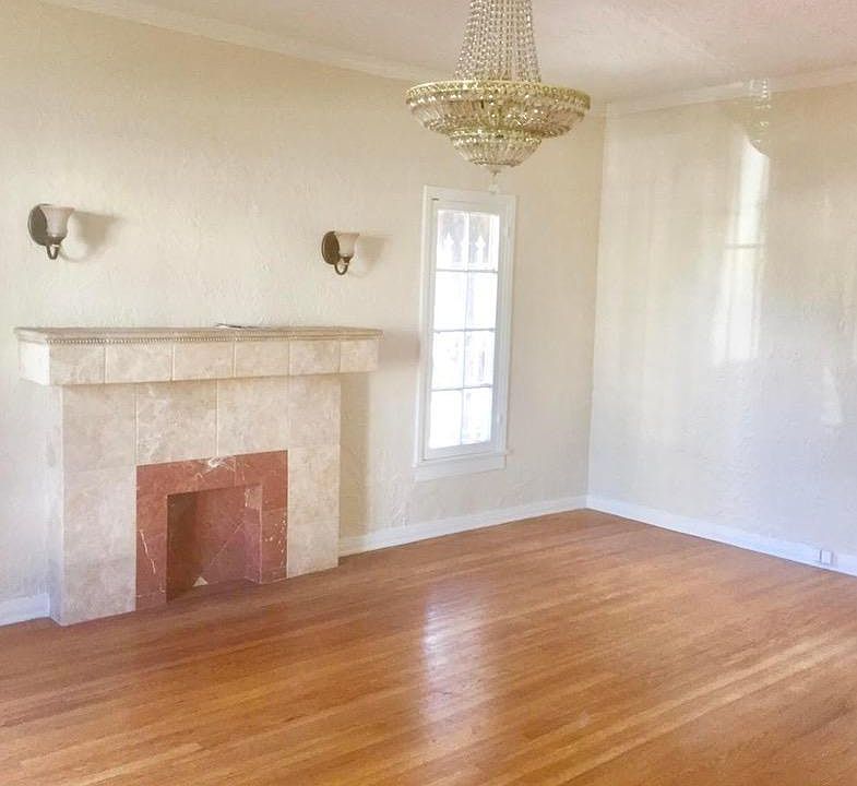 Living Room with Decorative Fireplace