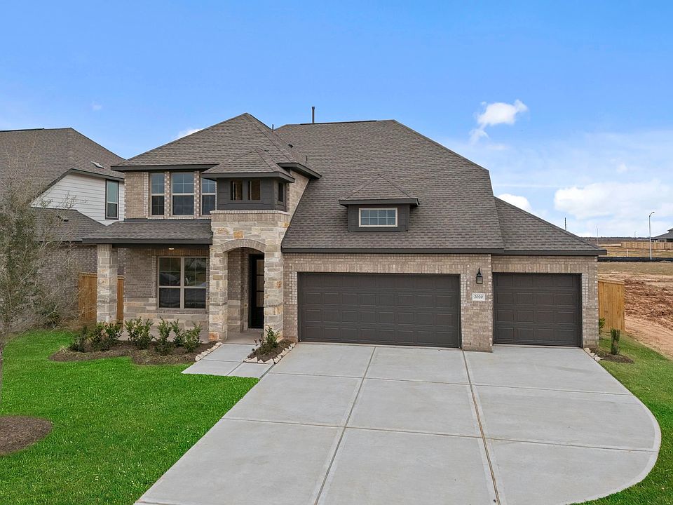 Welcome home to 2020 Blue Mar Drive located in Sunterra Lakes and zoned to Royal ISD.