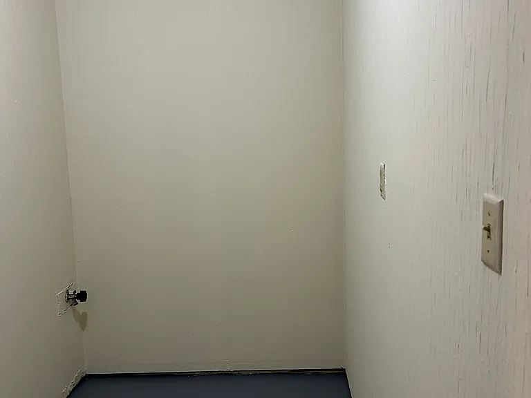 Small storage area in garage.