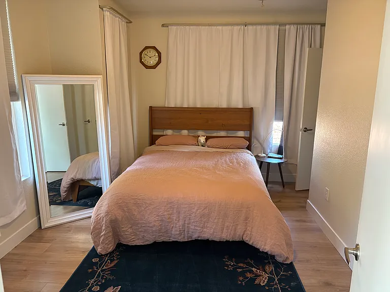 First floor bedroom with blackout shades and curtains