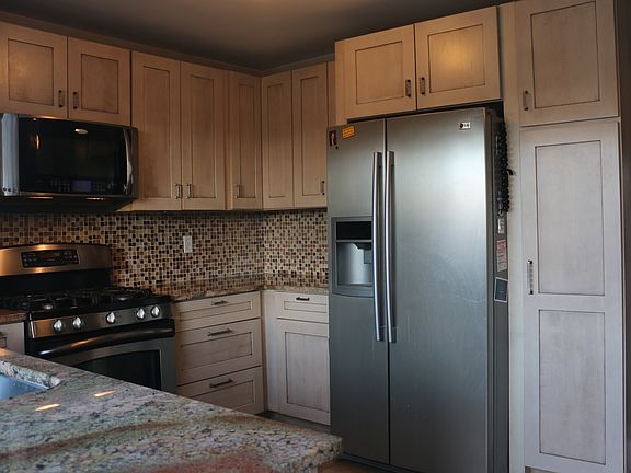 SS Refrigerator Included