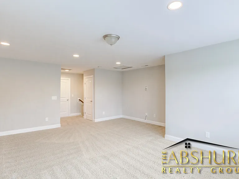 3rd floor suite with walk in closet, full bathroom, additional storage and efficient recessed lights