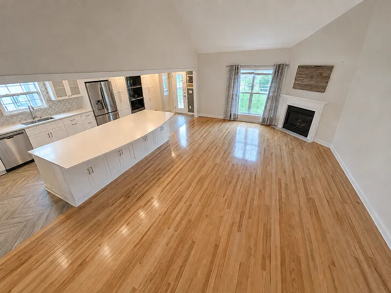 Open Floor Plan Living Room, with Large Center Island and Breakfast Bar