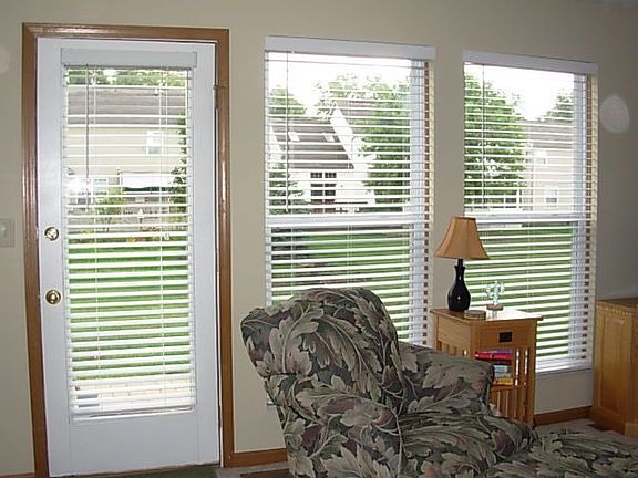 New 2" blinds highlight the large window area and atrium door.