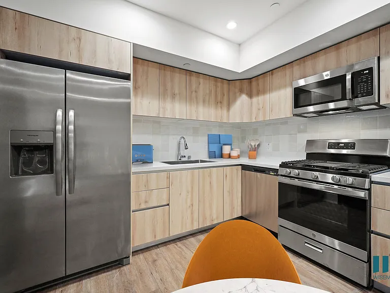 Kitchen with Energy-Efficient Appliances and Ample Cabinet Storage