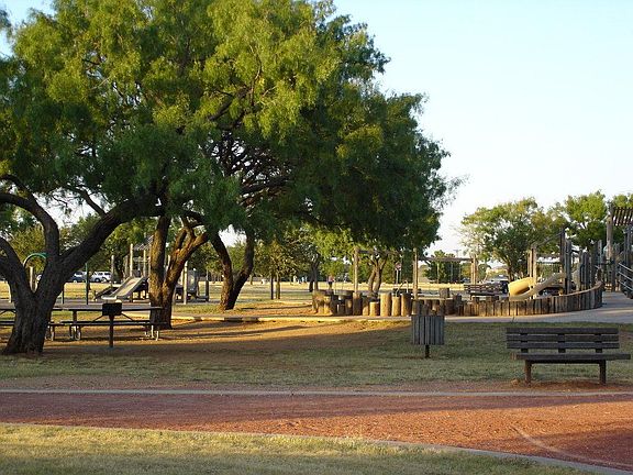 BEAUTIFUL RED BUD PARK IS RIGHT ACROSS THE STREET! WITH THE PICKNIC AREAS, PLAYGROUND, AND SPLASH PAD WAITING FOR YOUR KIDS!