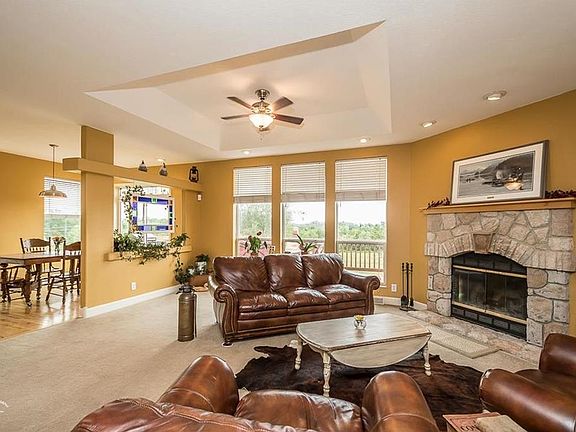 View of breakfast room from family room! Double doors lead out onto deck from main level.